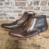 Pair of leather cleats