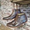 Pair of leather cleats